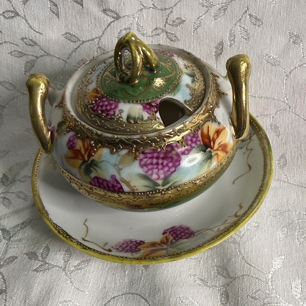 Elegant Vintage sugar bowl serveware with gold handles and purple grape design.